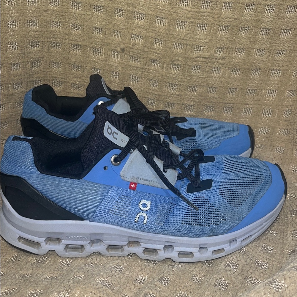 On Running Blue and Black Athletic Shoes